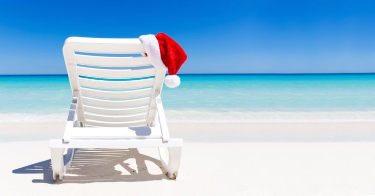 Santa,Claus,Hat,On,Sunbed,Near,Tropical,Calm,Beach,With